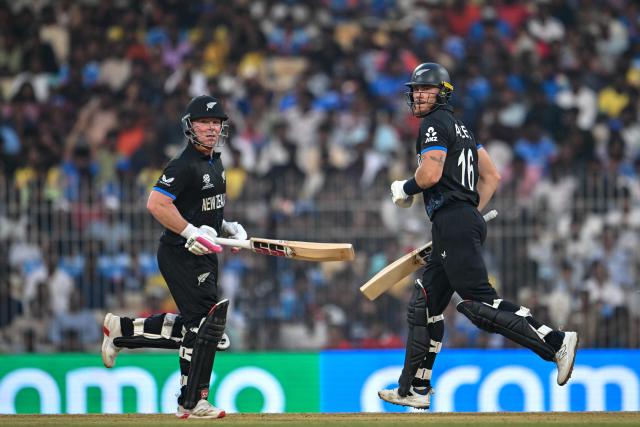 New Zealand's Tim Seifert (L) and Finn Allen run between the wickets during the 2026 ICC Men's T20 Cricket World Cup group stage match between New Zealand and United Arab Emirates at the MA Chidambaram Stadium in Chennai on February 10, 2026. (Photo by R. Satish BABU / AFP)