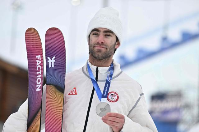 Silver medallist USA's Alex Hall celebrates on the podium after the freestyle skiing men's freeski slopestyle final during the Milano Cortina 2026 Winter Olympic Games at Livigno Snow Park, in Livigno (Valtellina), on February 10, 2026. (Photo by Jeff PACHOUD / AFP)
