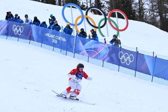 France's Marie Duaux competes in the freestyle skiing women's moguls qualification 1 during the Milano Cortina 2026 Winter Olympic Games at Livigno Aerials & Moguls Park, in Livigno (Valtellina), on February 10, 2026. (Photo by Kirill KUDRYAVTSEV / AFP)