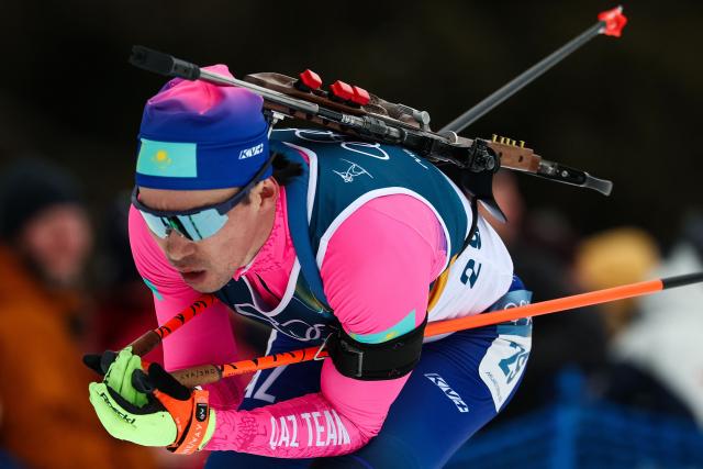 Kazakhstan's Asset Dyussenov skis during the men's biathlon 20km individual event during the Milano Cortina 2026 Winter Olympic Games at the Anterselva Biathlon Arena (Sudtirol Arena) in Anterselva (Val Pusteria) on February 10, 2026. (Photo by FRANCK FIFE / AFP)