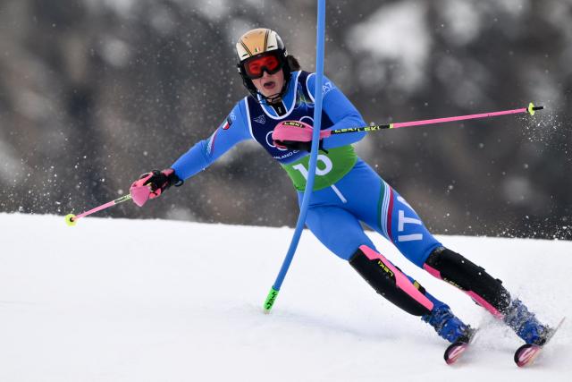 Italy's Anna Trocker competes in the slalom run of the women's team combined event during the Milano Cortina 2026 Winter Olympic Games at the Tofane Alpine Skiing Centre in Cortina d’Ampezzo on February 10, 2026. (Photo by Marco BERTORELLO / AFP)