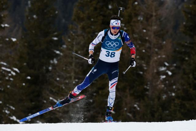 France's Eric Perrot skis during the men's biathlon 20km individual event during the Milano Cortina 2026 Winter Olympic Games at the Anterselva Biathlon Arena (Sudtirol Arena) in Anterselva (Val Pusteria) on February 10, 2026. (Photo by Odd ANDERSEN / AFP)