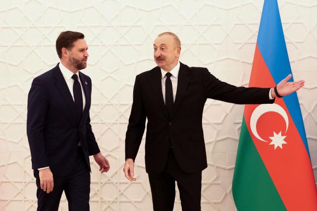 US Vice President JD Vance (L) meets with Azerbaijani President Ilham Aliyev at the Zagulba Presidential Residence in Baku, on February 10, 2026. (Photo by Kevin Lamarque / POOL / AFP)