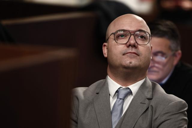 (FILES) Mayor of Orange Yann Bompard awaits his trial at the Marseille courthouse in Marseille on December 17, 2025. Yann Bompard returns to his mayoral seat in this far-right stronghold following an appeal against the prefectural order that removed him from office at the end of January after a court conviction, the Vaucluse prefecture announced on February 10, 2026. "Yann Bompard having appealed the decision of the Judicial Court of January 26, 2026 and having also filed an appeal on February 6 against the order of automatic dismissal of January 27 before the Administrative Court of Nimes, the order of automatic dismissal from his mandate as municipal councilor and mayor is suspended as of the date of his appeal," the prefecture said. (Photo by Thibaud MORITZ / AFP)