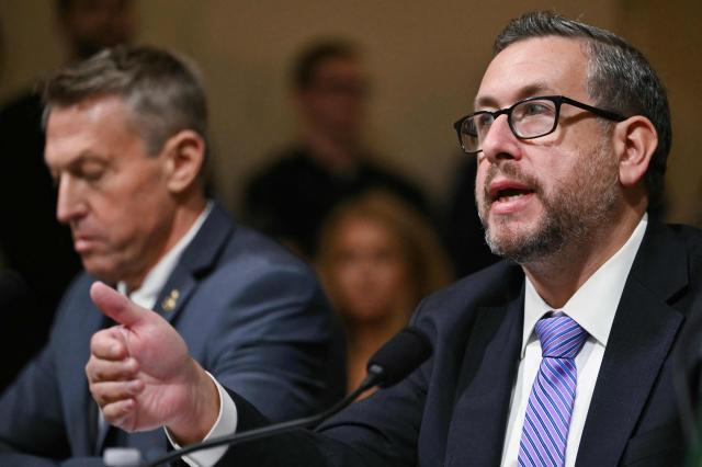 (L/R) Rodney Scott, Commissioner of US Customs and Border Protection (CBP) and Joseph Edlow, Director of US Citizenship and Immigration Services (USCIS), testify during a House Committee on Homeland Security hearing on Oversight of the Department of Homeland Security on Capitol Hill in Washington, DC, on February 10, 2026. (Photo by ANDREW CABALLERO-REYNOLDS / AFP)
