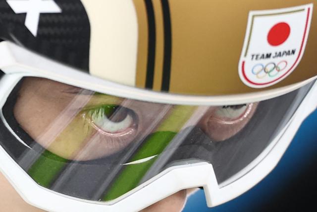 Japan's Nozomi Maruyama looks on before a jump during the ski jumping mixed team trial round of the Milano Cortina 2026 Winter Olympic Games at Predazzo Ski Jumping Stadium in Predazzo (Val di Fiemme), on February 10, 2026. (Photo by Anne-Christine POUJOULAT / AFP)