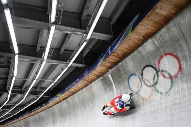 Poland's Klaudia Domaradzka competes in the luge women's singles run 3 at Cortina Sliding Centre during the Milano Cortina 2026 Winter Olympic Games in Cortina d'Ampezzo on February 10, 2026. (Photo by Tiziana FABI / AFP)