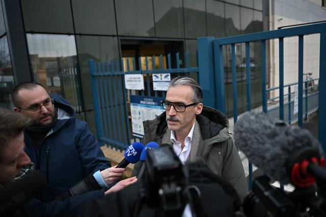 Richard Delgenes, lawyer of Monique Olivier, the former partner of serial killer Michel Fourniret, speaks to press after a hearing with his client and the judge in charge of the investigation into the disappearance of Lydie Loge, at the Gendarmerie heaquarters in Argentan on February 10, 2026. Lydie Loge, mother of a seven-year-old boy, disappeared on December 18, 1993 at the age of 29 in Saint-Christophe-le-Jajolet, a small village of 240 inhabitants. While two investigations resulted in dismissals, the investigations were relaunched in 2018 after connections were made between DNA traces from organic compounds found in Michel Fourniret's van and the DNA of Lydie Loge's mother. (Photo by LOU BENOIST / AFP)