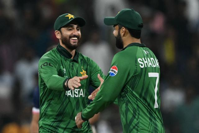 Pakistan's captain Salman Agha and Shadab Khan celebrate their win in the end of the 2026 ICC Men's T20 Cricket World Cup group stage match against USA at the Sinhalese Sports Club (SSC) Ground in Colombo on February 10, 2026. (Photo by Ishara S.KODIKARA / AFP)