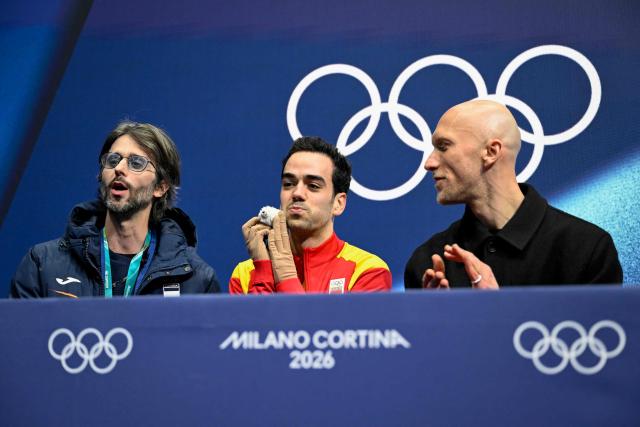 Spain's Tomas Llorenc Guarino Sabate waits for his results at the kiss and cry area after competing in the figure skating men's singles short program during the Milano Cortina 2026 Winter Olympic Games at Milano Ice Skating Arena in Milan on February 10, 2026. (Photo by WANG Zhao / AFP)