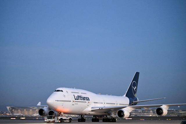 (FILES) A Boeing 747-400 airplane of German airline Lufthansa is parked outside the new Terminal 3 of Frankfurt Airport (FRA) in Frankfurt am Main, western Germany on December 16, 2025, as part of the chancellor's inaugural visit to the German state of Hesse. The Vereinigung Cockpit German pilots' union has called for a strike on February 10, 2026 due to an ongoing pension dispute, a spokeswoman told AFP.
The call will affect flights under the Lufthansa brand as well as the Lufthansa Cargo freight division, the spokeswoman said on on February 10, 2026. (Photo by Kirill KUDRYAVTSEV / AFP)