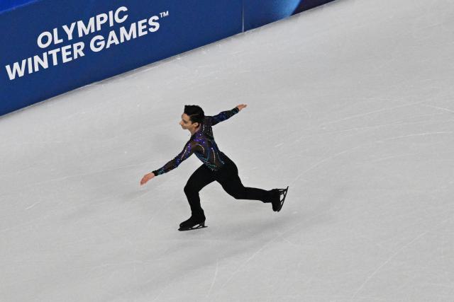 Mexico's Donovan Carrillo competes in the figure skating men's singles short program during the Milano Cortina 2026 Winter Olympic Games at Milano Ice Skating Arena in Milan on February 10, 2026. (Photo by Antonin THUILLIER / AFP)