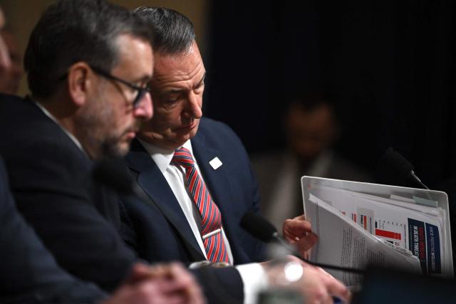 (L/R) Joseph Edlow, Director of US Citizenship and Immigration Services (USCIS), and Todd Lyons, acting director of US Immigration and Customs Enforcement (ICE), look at notes during a House Committee on Homeland Security hearing on Oversight of the Department of Homeland Security on Capitol Hill in Washington, DC, on February 10, 2026. (Photo by ANDREW CABALLERO-REYNOLDS / AFP)