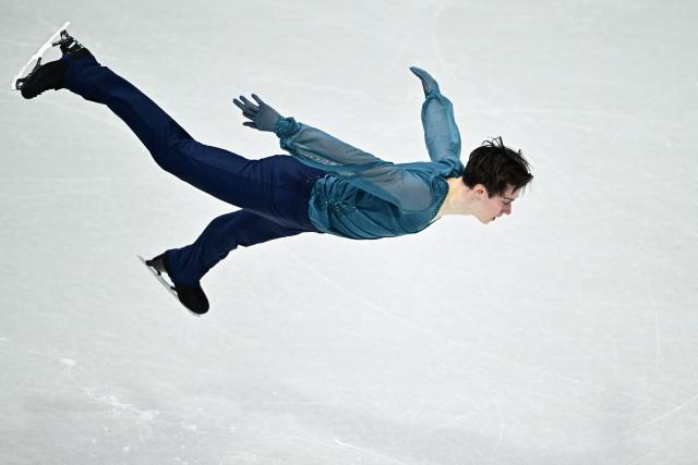 Ukraine's Kyrylo Marsak competes in the figure skating men's singles short program during the Milano Cortina 2026 Winter Olympic Games at Milano Ice Skating Arena in Milan on February 10, 2026. (Photo by JULIEN DE ROSA / AFP)