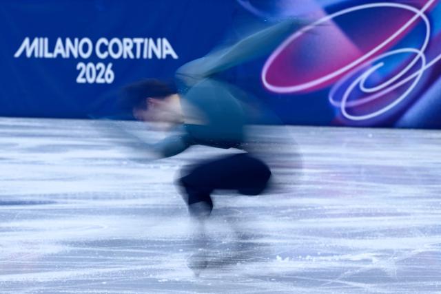 Ukraine's Kyrylo Marsak competes in the figure skating men's singles short program during the Milano Cortina 2026 Winter Olympic Games at Milano Ice Skating Arena in Milan on February 10, 2026. (Photo by WANG Zhao / AFP)