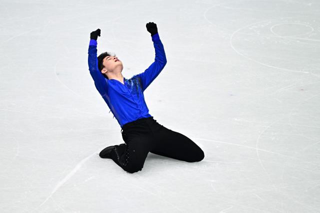 South Korea's Kim Hyungyeom competes in the figure skating men's singles short program during the Milano Cortina 2026 Winter Olympic Games at Milano Ice Skating Arena in Milan on February 10, 2026. (Photo by JULIEN DE ROSA / AFP)