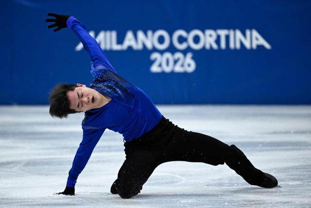 South Korea's Kim Hyungyeom competes in the figure skating men's singles short program during the Milano Cortina 2026 Winter Olympic Games at Milano Ice Skating Arena in Milan on February 10, 2026. (Photo by WANG Zhao / AFP)