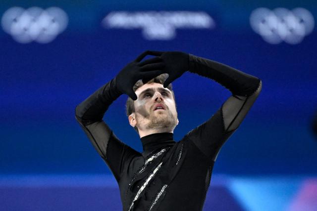 Italy's Matteo Rizzo competes in the figure skating men's singles short program during the Milano Cortina 2026 Winter Olympic Games at Milano Ice Skating Arena in Milan on February 10, 2026. (Photo by WANG Zhao / AFP)