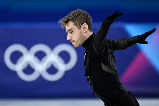 Italy's Matteo Rizzo competes in the figure skating men's singles short program during the Milano Cortina 2026 Winter Olympic Games at Milano Ice Skating Arena in Milan on February 10, 2026. (Photo by WANG Zhao / AFP)