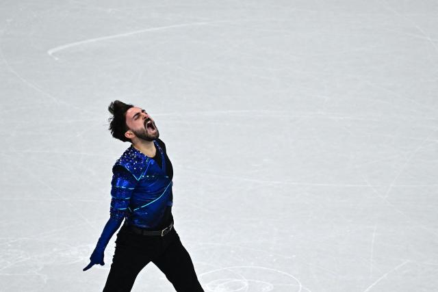 France's Kevin Aymoz competes in the figure skating men's singles short program during the Milano Cortina 2026 Winter Olympic Games at Milano Ice Skating Arena in Milan on February 10, 2026. (Photo by JULIEN DE ROSA / AFP)