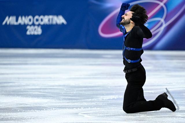 France's Kevin Aymoz competes in the figure skating men's singles short program during the Milano Cortina 2026 Winter Olympic Games at Milano Ice Skating Arena in Milan on February 10, 2026. (Photo by WANG Zhao / AFP)