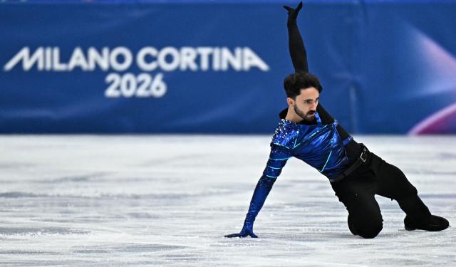 France's Kevin Aymoz competes in the figure skating men's singles short program during the Milano Cortina 2026 Winter Olympic Games at Milano Ice Skating Arena in Milan on February 10, 2026. (Photo by Gabriel BOUYS / AFP)