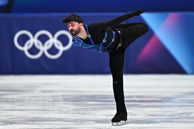 France's Kevin Aymoz competes in the figure skating men's singles short program during the Milano Cortina 2026 Winter Olympic Games at Milano Ice Skating Arena in Milan on February 10, 2026. (Photo by Gabriel BOUYS / AFP)