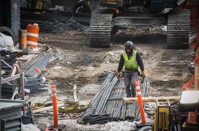 Workers are seen at the site of the Gateway Tunnel construction project in the Manhattan borough of New York City on February 10, 2026. According to US media reports, a federal judge has given the Trump administration until Thursday, February 12, 2026, to resume payments for the Gateway Tunnel project.  Last week, US President Donald Trump offered to unfreeze federal infrastructure funding if the top Senate Democrat would help rename a major airport and train station after him, US media reported. (Photo by Kena Betancur / AFP)