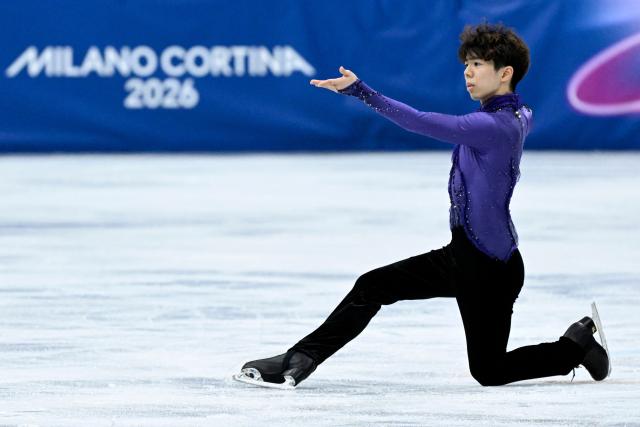 Japan's Shun Sato competes in the figure skating men's singles short program during the Milano Cortina 2026 Winter Olympic Games at Milano Ice Skating Arena in Milan on February 10, 2026. (Photo by WANG Zhao / AFP)