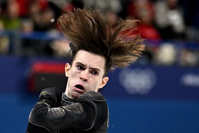 Kazakhstan's Mikhail Shaidorov competes in the figure skating men's singles short program during the Milano Cortina 2026 Winter Olympic Games at Milano Ice Skating Arena in Milan on February 10, 2026. (Photo by Gabriel BOUYS / AFP)