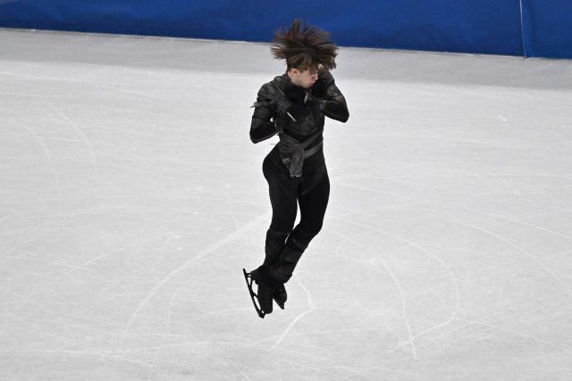 Kazakhstan's Mikhail Shaidorov competes in the figure skating men's singles short program during the Milano Cortina 2026 Winter Olympic Games at Milano Ice Skating Arena in Milan on February 10, 2026. (Photo by Antonin THUILLIER / AFP)