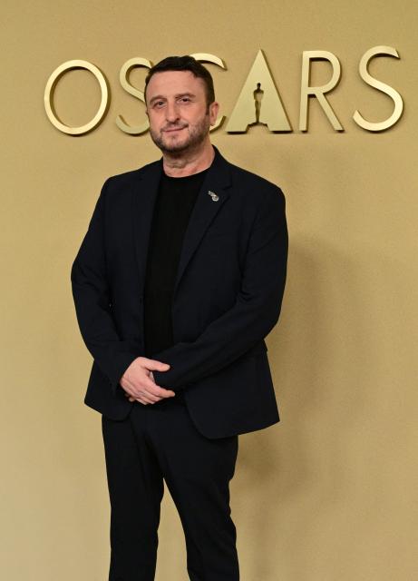 US special-effects and make-up artist Mike Hill attends the 98th Oscars Nominees Luncheon at the Beverly Hilton hotel in Beverly Hills, California on February 10, 2026. (Photo by Frederic J. Brown / AFP)