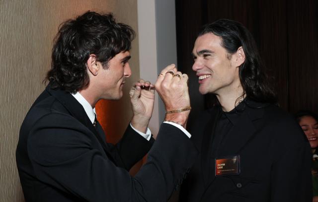 Australian actor Jacob Elordi (L) and French-Spanish film director Oliver Laxe attend the 98th Oscars Nominees Luncheon at the Beverly Hilton hotel in Beverly Hills, California on February 10, 2026. (Photo by Patrick T. FALLON / AFP)