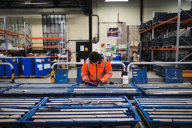 (FILES) An employee works on a mining core line at the lithium plant of French multinational industrial minerals company Imerys in Echassierres, central France, on January 17, 2024. Minerals specialist Imerys announces it receives a minority investment from the French State in its lithium mining project in the Allier, through a Ђ50?million contribution from the Banque des Territoires on February 11, 2026. (Photo by OLIVIER CHASSIGNOLE / AFP)