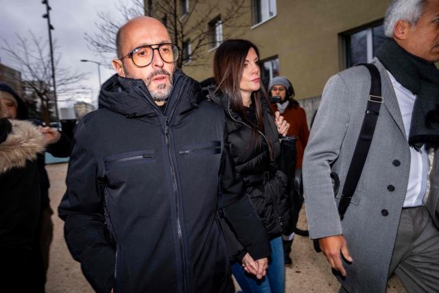 Co-owner of Le Constellation bar Jacques Moretti (L) and Jessica Moretti (C) arrive to attend a hearing at the Office of the public prosecutor of the Canton of Valais as part of the inquiry into a devastating New Year's fire in Sion on February 11, 2026. 41 people, most of them teenagers, were killed, while 115 were injured in a fire that ripped through in Le Constellation bar in the Alpine ski resort of Crans-Montana on New Year's Eve. (Photo by Maxime SCHMID / AFP)