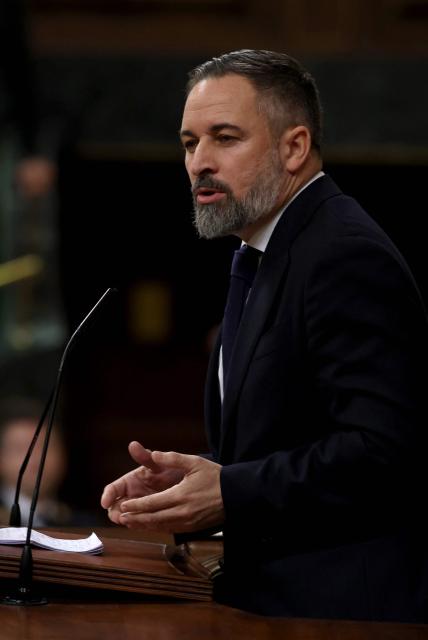 Spain's far-right party Vox leader Santiago Abascal talks after Spain's Prime minister addressed parliament over January train tragedy at the congress in Madrid on February 11, 2026. Two train accidents raised questions about Spanish rail safety. The collision of two high-speed trains in the southern region of Andalusia claimed 46 lives and a regional train accident in Catalunya killed one last month. (Photo by Pierre-Philippe MARCOU / AFP)