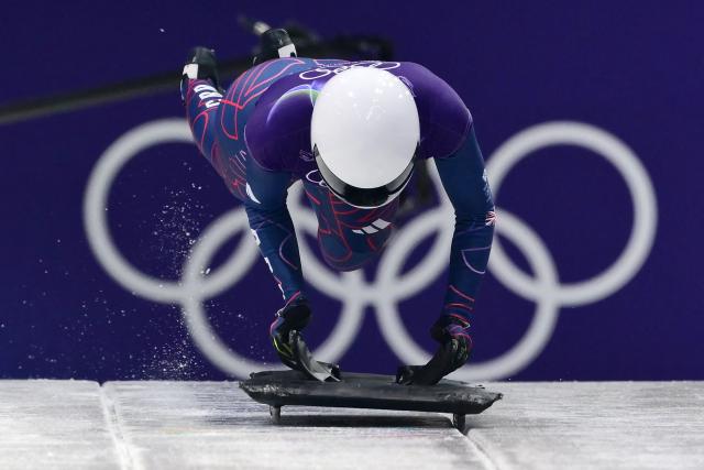Britain's Tabitha Stoecker takes part in the skeleton women's training session at Cortina Sliding Centre during the Milano Cortina 2026 Winter Olympic Games in Cortina d'Ampezzo on February 11, 2026. (Photo by Stefano RELLANDINI / AFP)