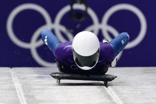 Britain's Tabitha Stoecker takes part in the skeleton women's training session at Cortina Sliding Centre during the Milano Cortina 2026 Winter Olympic Games in Cortina d'Ampezzo on February 11, 2026. (Photo by Stefano RELLANDINI / AFP)