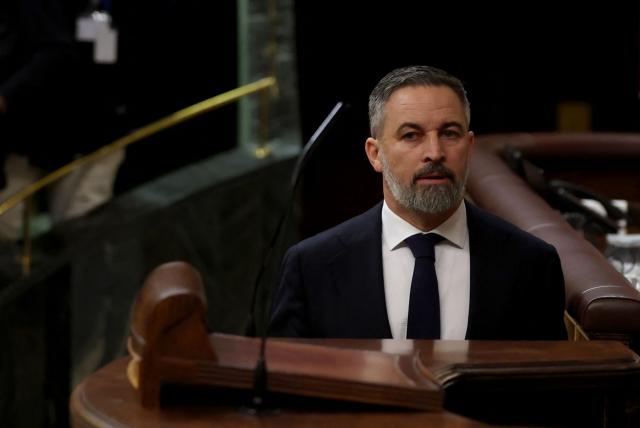 Spain's far-right party Vox leader Santiago Abascal prepares to talk after Spain's Prime minister addressed parliament over January train tragedy at the congress in Madrid on February 11, 2026. Two train accidents raised questions about Spanish rail safety. The collision of two high-speed trains in the southern region of Andalusia claimed 46 lives and a regional train accident in Catalunya killed one last month. (Photo by Pierre-Philippe MARCOU / AFP)