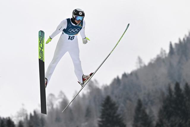 Czech Republic's Jan Vytrval jumps in the competition round of the ski jumping of the nordic combined individual Gundersen normal hill/10km event at Predazzo Ski Jumping Stadium in Predazzo (Val di Fiemme) during the Milano Cortina 2026 Winter Olympic Games on February 11, 2026. (Photo by Javier SORIANO / AFP)