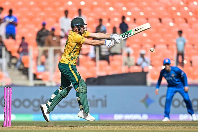 South Africa's David Miller plays a shot during the second super over at the 2026 ICC Men's T20 Cricket World Cup group stage match between Afghanistan and South Africa in the Narendra Modi Stadium, Ahmedabad on February 11, 2026. (Photo by Shammi MEHRA / AFP)