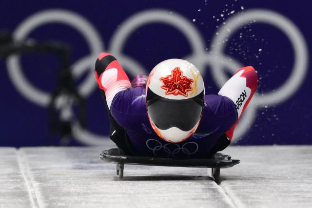 Canada's Hallie Clarke takes part in the skeleton women's training session at Cortina Sliding Centre during the Milano Cortina 2026 Winter Olympic Games in Cortina d'Ampezzo on February 11, 2026. (Photo by Stefano RELLANDINI / AFP)