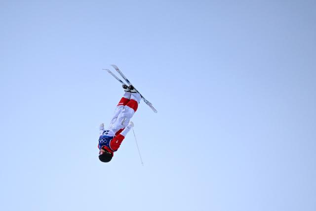 France's Marie Duaux competes in the freestyle skiing women's moguls qualification 2 during the Milano Cortina 2026 Winter Olympic Games at Livigno Aerials & Moguls Park, in Livigno (Valtellina), on February 11, 2026. (Photo by Kirill KUDRYAVTSEV / AFP)
