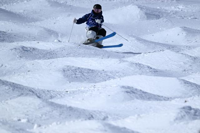 South Korea's Yun Shin-Ee competes in the freestyle skiing women's moguls qualification 2 during the Milano Cortina 2026 Winter Olympic Games at Livigno Aerials & Moguls Park, in Livigno (Valtellina), on February 11, 2026. (Photo by Kirill KUDRYAVTSEV / AFP)