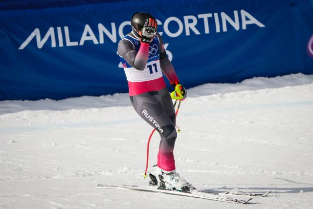 Austria's Stefan Babinsky reacts in the finish area of the men's super-G alpine skiing event during the Milano Cortina 2026 Winter Olympic Games at the Stelvio Ski Centre in Bormio (Valtellina) on February 11, 2026. (Photo by Dimitar DILKOFF / AFP)