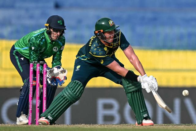 Australia's Matt Renshaw (R) plays a shot during the 2026 ICC Men's T20 Cricket World Cup group stage match between Ireland and Australia at R Premadasa Stadium in Colombo on February 11, 2026. (Photo by Ishara S.KODIKARA / AFP)