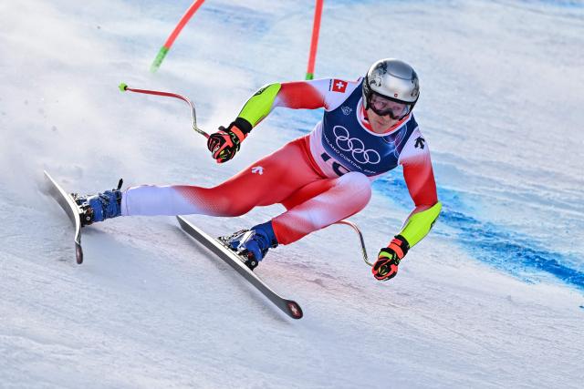 Switzerland's Marco Odermatt competes in the men's super-G alpine skiing event during the Milano Cortina 2026 Winter Olympic Games at the Stelvio Ski Centre in Bormio (Valtellina) on February 11, 2026. (Photo by Fabrice COFFRINI / AFP)