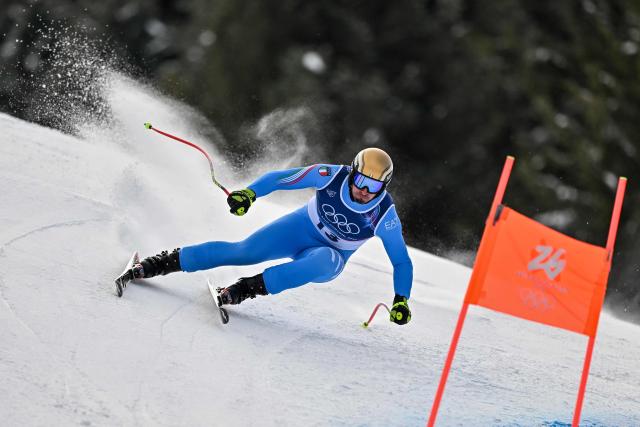 Italy's Dominik Paris competes in the men's super-G alpine skiing event during the Milano Cortina 2026 Winter Olympic Games at the Stelvio Ski Centre in Bormio (Valtellina) on February 11, 2026. (Photo by Fabrice COFFRINI / AFP)