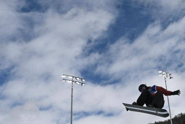 Germany's Leilani Ettel competes in the snowboard women's halfpipe qualification run 2 during the Milano Cortina 2026 Winter Olympic Games at Livigno Snow Park, in Livigno (Valtellina), on February 11, 2026. (Photo by Jeff PACHOUD / AFP)