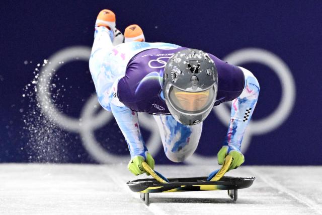 Ukraine's Vladyslav Heraskevych takes part in the skeleton men's training session at Cortina Sliding Centre during the Milano Cortina 2026 Winter Olympic Games in Cortina d'Ampezzo on February 11, 2026. (Photo by Tiziana FABI / AFP)
